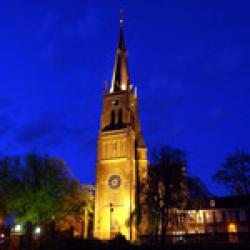 Met palmpasenstok door de kerk